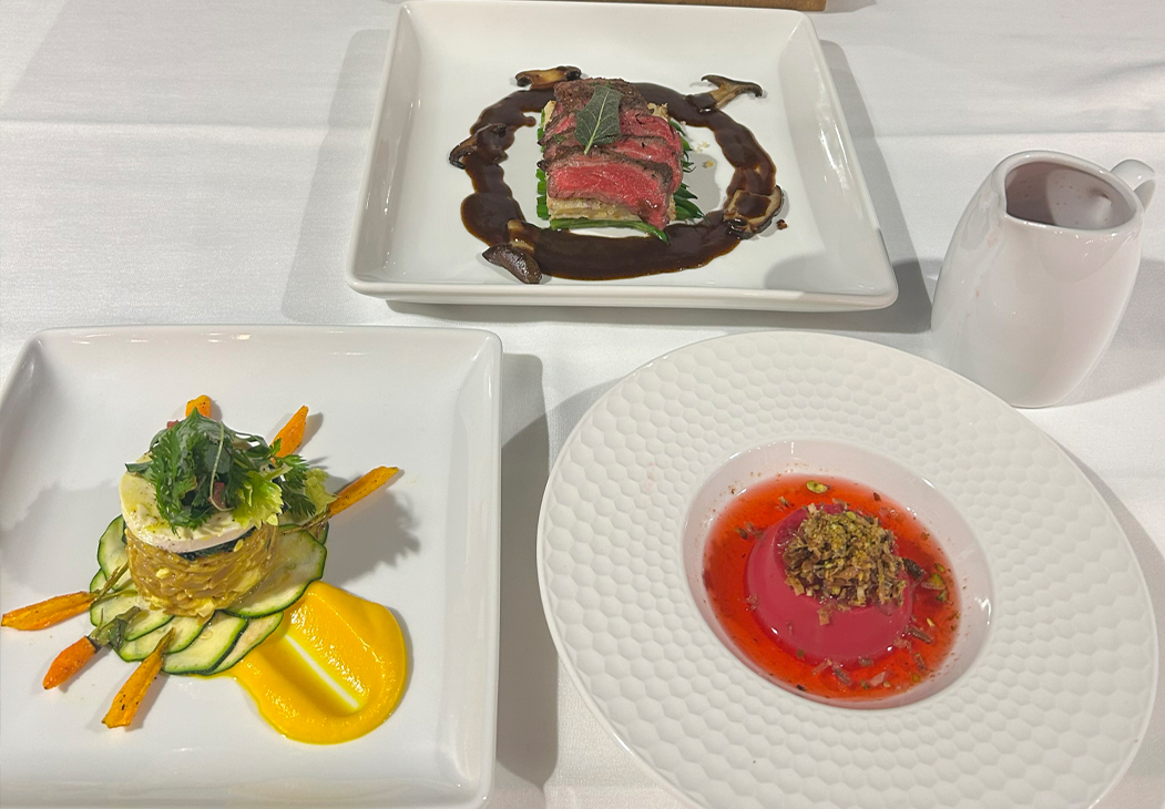 Meals the chefs presented consisting of tofu and orzo salad, spinalis steak with trumpet demi, and beet panna cotta