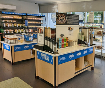 Bulls on the Run at Greiner's self-serve areas including Grab-n-Go, hot bar, coffees, and bakery items