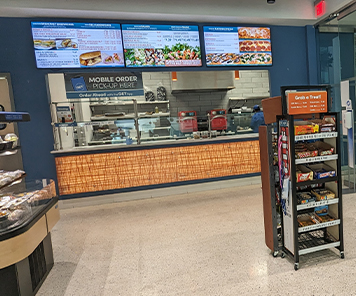 Scatter area of the cafe facing the digital signage menuboards