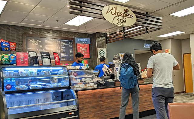 Students ordering at the Whispers Abbott counter