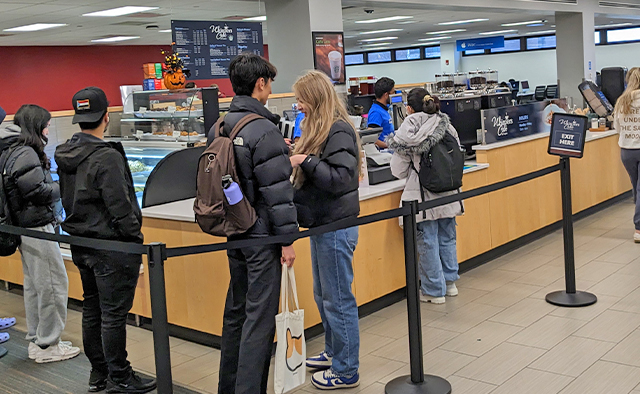 Students in line to order at Whispers Café in Capen Hall, photo taken from the left