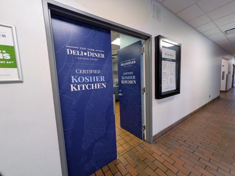 Fall 2026 refresh of the diner entrance with the logo on the door