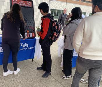 Students participating in the game at the Have a Coke Day table