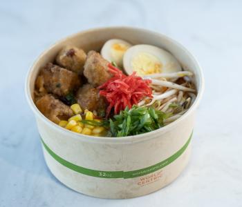 Fried tofu noodle bowl with egg, bean sprouts, corn and pickled veggies from Noodle Pavilion. by Onion Studio.