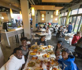 Students dining at C3 during Lobster Night. Photo by Onion Studio.