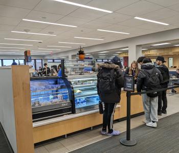 Students in line at Whispers in Silverman Library.