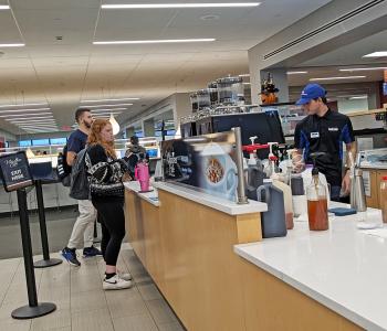 Students in line at Whispers in Silverman Library.