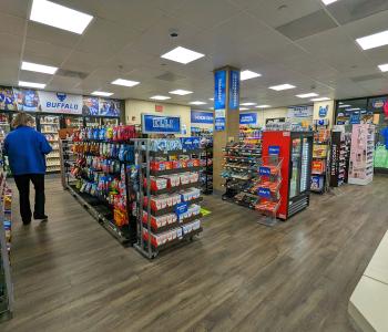 As you walk into the Elli convenience store, shelves of products are spread throughout.