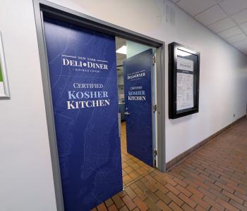 Fall 2026 refresh of the diner entrance with the logo on the door